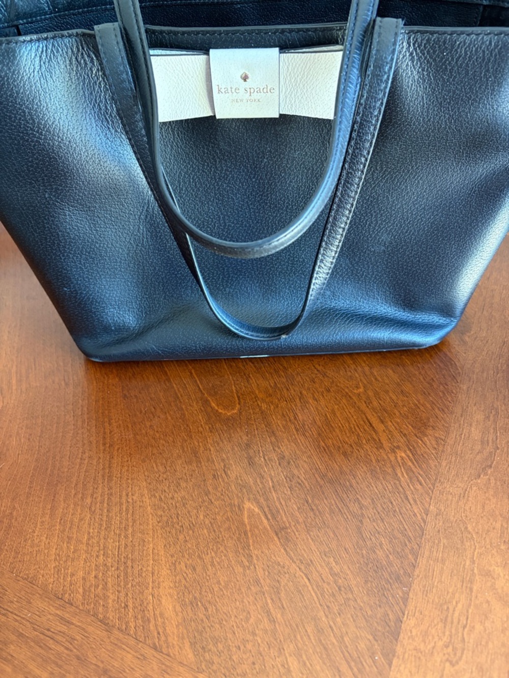 kate spade black leather tote with cream logo tab